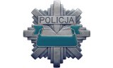 odznaka z napisem Policja