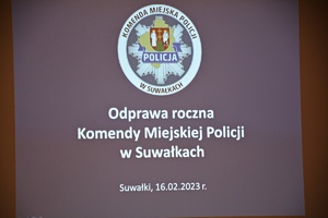 Slajd wyświetlony z logo KMP w Suwałkach oraz napisem Odprawa roczna KMP w Suwałkach 16 luty 2023 rok